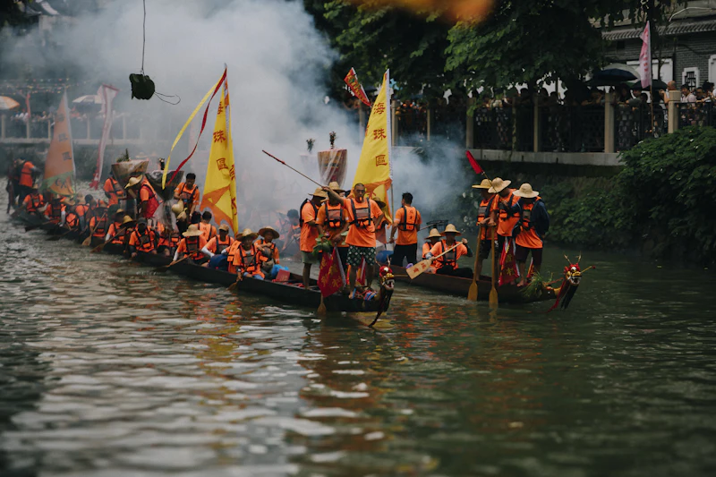 Traditional dragon boats with yellow flags