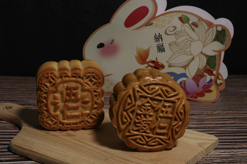 Mooncakes beside a paper rabbit
